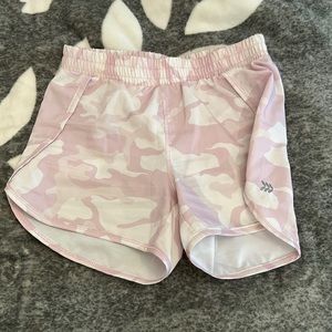 Pink camo all in motion shorts.